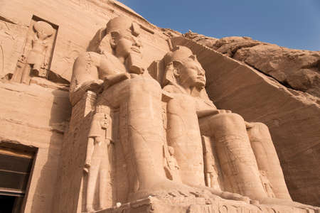 Ancient Egyptian temple built by Ramses II, carved in the stone of the mountain, in Abu Simbel next...
