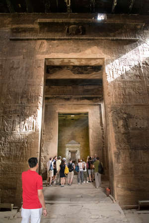 Magnificent and ancient temple of Edfu, located on the western bank of the Nile River in Egypt,...