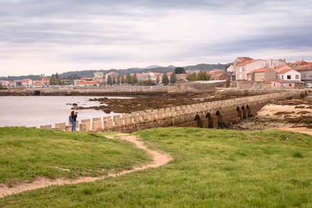 Puen of the island of San SadurniÃ±o and view of Cambados, Rias Bajas, Pontevedra, Galicia, Spain, Europeのeditorial素材