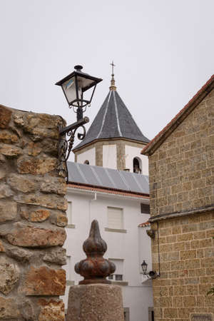Tower and lamppost in the Sanctuary of Nuestra SeÃ±ora del CastaÃ±ar, in Bejar, Salamanca, Castilla Leon, Spain. Europe. Construction.の写真素材