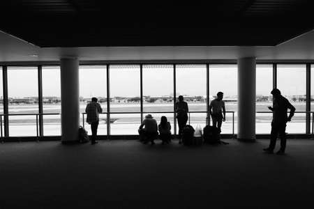 Bangkok - September 5, 2015 - Group of passengers waiting for boarding at Gate35 Don Muang International Airportのeditorial素材
