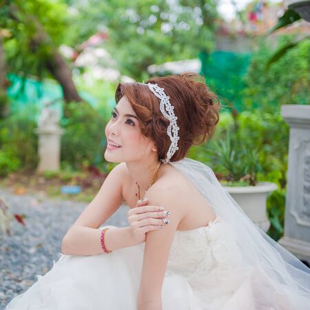 Beautiful Asian Woman wear a wedding dressの写真素材