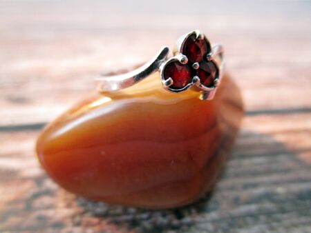 Ring with stone on tableの写真素材