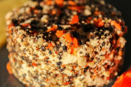 Spice hand made cheese on dark background, close up photoの写真素材