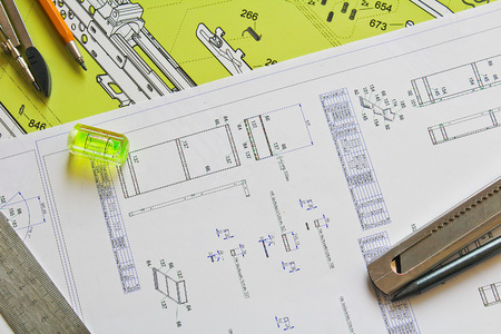 Plan with pencil, compasses, knife, water level and steel rule