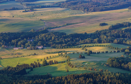 Nice detail on trees and small houses from kravi mountains, Czech landscapeの写真素材