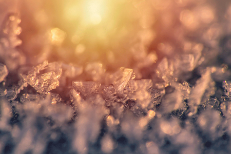 Macro of snow, frost with yellow and orange gradientの写真素材