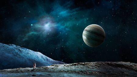Space background. Astronaut walk on land with blue nebula with jupiter planet.の写真素材