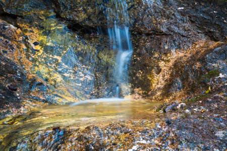 Detail of small waterfall in Austrian Alps, near Attersee. Long exposureの写真素材