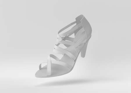 Creative minimal paper idea. Concept white shoe with white background. 3d render, 3d illustration.の写真素材