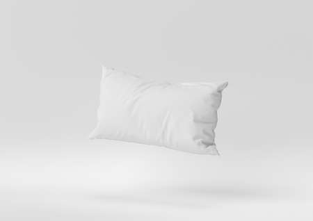 Creative minimal paper idea. Concept white pillow with white background. 3d render, 3d illustration.の写真素材