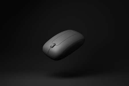 black wireless mouse floating on black background. minimal concept idea. monochrome. 3d render.の写真素材