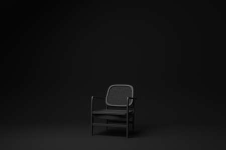 Black wooden comfortable chair on Black background. minimal concept idea. monochrome. render render.の写真素材