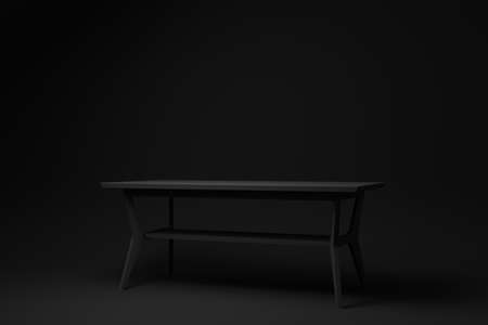 Black modern table or dining table on black background. minimal concept idea. monochrome. 3d render.の写真素材