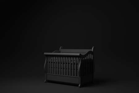 Black baby cot on Black background. minimal concept idea. monochrome. render render.の写真素材