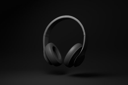 Black headphone floating on black background. minimal concept idea. monochrome. 3d render.の写真素材