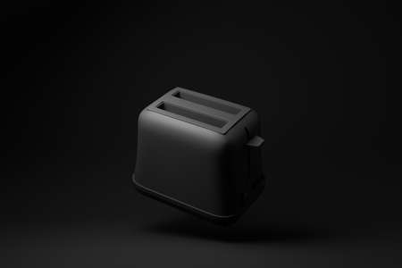 Black toaster floating on black background. minimal concept idea. monochrome. 3d render.の写真素材