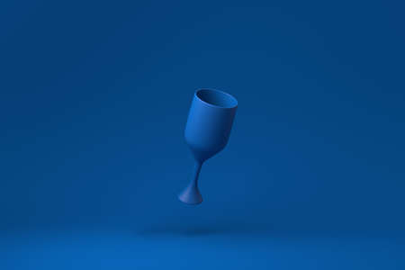 Blue Wine glass floating in blue background. minimal concept idea creative. monochrome. 3D render.の写真素材