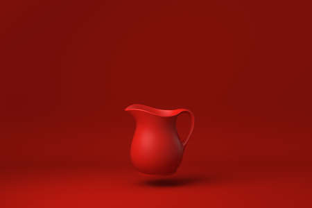 Red Pitcher or milk jug floating in Red background. minimal concept idea creative. monochrome. 3D render.の写真素材