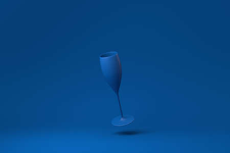 Blue Wine glass floating in blue background. minimal concept idea creative. monochrome. 3D render.の写真素材