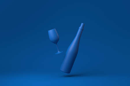 Blue Wine bottle and glass floating in blue background. minimal concept idea creative. monochrome. 3D render.の写真素材