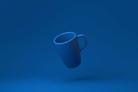 Blue Mugs or Coffee cup floating in blue background. minimal concept idea creative. monochrome. 3D render.の写真素材