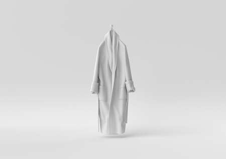 White Bathrobe in white background. minimal concept idea creative. monochrome. 3D render.の写真素材