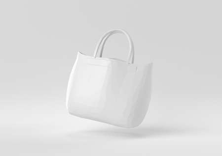 White Bag Women Fashion accessories floating in white background. minimal concept idea creative. origami style. 3D render.の写真素材