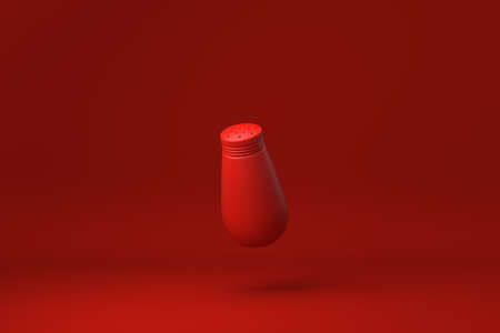 Red Pepper shaker floating in Red background. minimal concept idea creative. monochrome. 3D render.の写真素材