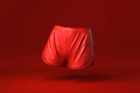 Red Shorts in red background. minimal concept idea creative. monochrome. 3D render.の写真素材