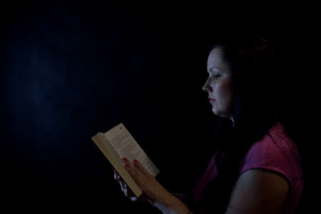 Woman with bookの写真素材