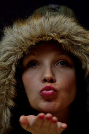 woman with a hood with fur