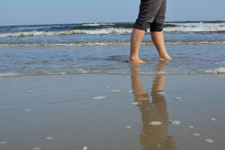 Foots in the seaの写真素材