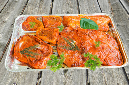 Barbecue food, barbecue meat marinated in a foil dish の写真素材