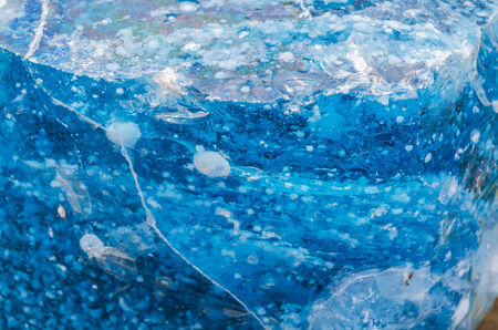 Quartz stone, glass stone pieces in blue as decoration for home and garden   の写真素材
