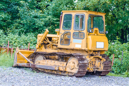 VELBERT, GERMANY - MAY 29 2014  On an old factory site in the city of Velbert in NRW is this old tracked vehicle, caterpillar bulldozer  The Olttimer, awaiting use のeditorial素材