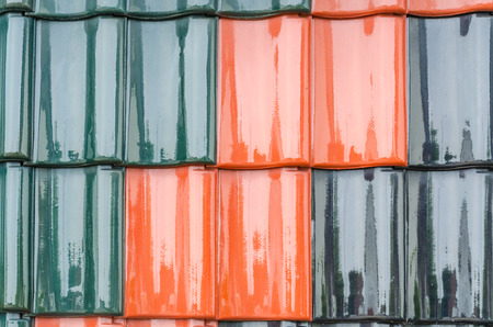 Close up of red, black roof tiles and pans, texture の写真素材