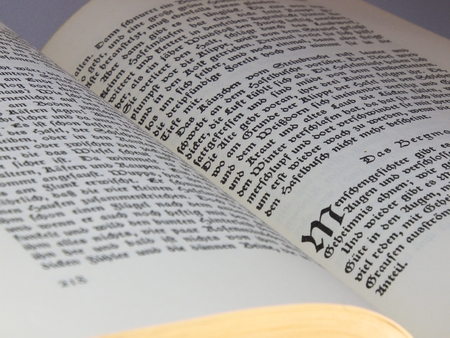 Heiligenhaus, Nrw, Germany - February 12, 2014: Photo of a pile of old books of the famous writer Hermann Lons. Here see the works of 1 to 5 from a total of eight volumes. Hermann Lons was a German writer and journalist. Become known as a regional writer.のeditorial素材
