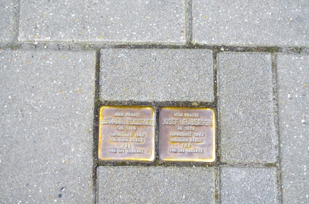 Velbert, North Rhine-Westphalia, Germany - April 1, 2014: Stumbling blocks in the pedestrian zone of Velbert center. Stumbling blocks are memorial plaques to help them remember the fate of the people in the Nazi period. The memorial stones are a project oのeditorial素材