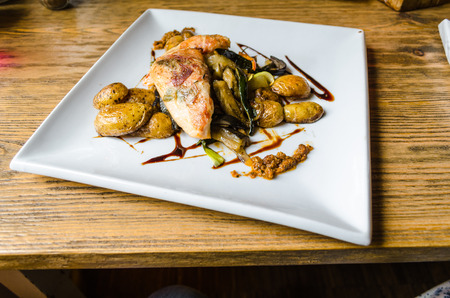 Chicken saltimbocca with sage vegetables and potatoes.の写真素材