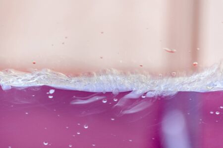 Close up of a blue liquid, water, background image.の写真素材