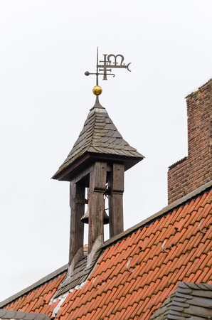 Church tower with blue cloudy sky.の写真素材