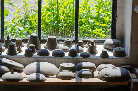Various bells of all sizes in a bell foundry.の写真素材