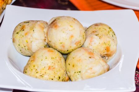 Potato dumplings served with a sdldeutschesGerichte Usually roast pork.