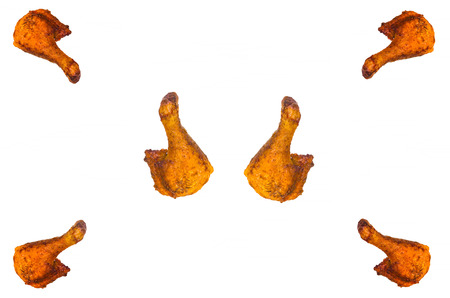 Close-up of 6 broilers legs in front of white background.の写真素材