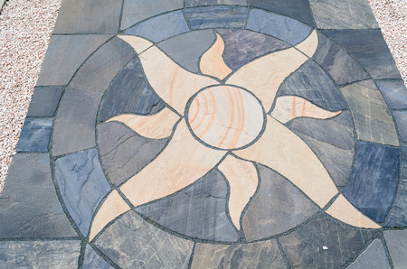 Details sun with stone floor tiles for outdoor garden