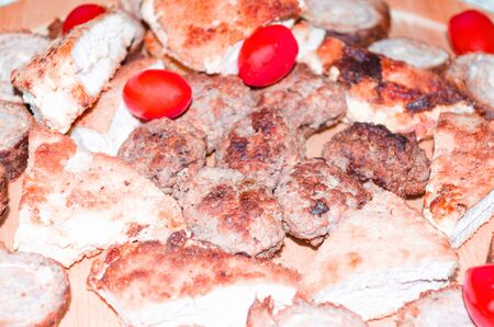 Party, meat plate sausage plate with various meats and vegetables.の写真素材