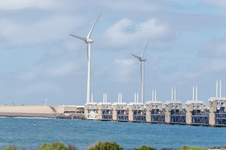 Wind turbine in the sea off the Dutch North Sea coast.の写真素材