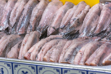 Fresh Matjes fish on ice cooled to the fish market.の写真素材