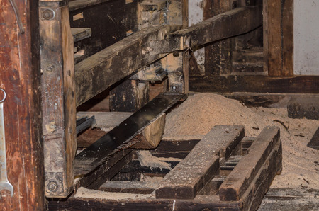 An old sawmill in operation. Manufacture of wooden boards.の写真素材